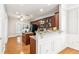 Modern kitchen with stone countertops, stainless appliances, and an island at 3725 Downing Dr, Cumming, GA 30040