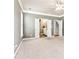 Large primary bedroom offers en suite access and walk in closets at 3725 Downing Dr, Cumming, GA 30040