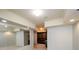 Basement area featuring custom built-in dark wood cabinets with granite countertops at 4645 Wykeshire Ct, Cumming, GA 30041
