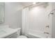 Bright bathroom featuring a shower over tub with tiled walls and updated fixtures at 4645 Wykeshire Ct, Cumming, GA 30041