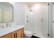 Beautiful bathroom featuring a glass shower and marble countertop and floors at 4645 Wykeshire Ct, Cumming, GA 30041