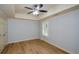 Comfortable bedroom with natural lighting, crown molding, and vinyl floors at 4645 Wykeshire Ct, Cumming, GA 30041