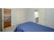 Bright bedroom with a double closet and an attached bathroom, and staircase at 4645 Wykeshire Ct, Cumming, GA 30041