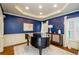 Formal dining room with classic wainscoting and elegant decor at 4645 Wykeshire Ct, Cumming, GA 30041