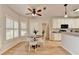 Charming breakfast area with a round table, plantation shutters and plenty of natural light at 1868 Birch Briar Bnd, Lawrenceville, GA 30043