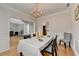 Charming dining room with hardwood floors and elegant chandelier at 1868 Birch Briar Bnd, Lawrenceville, GA 30043