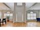Bright foyer with gleaming hardwood floors, high ceilings, and an abundance of natural light at 1868 Birch Briar Bnd, Lawrenceville, GA 30043