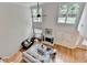 Spacious living room with high ceilings, wood floors, a fireplace, and ample seating, perfect for entertaining at 1868 Birch Briar Bnd, Lawrenceville, GA 30043