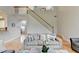 Inviting living room with hardwood floors, staircase access, and plenty of space for seating and relaxation at 1868 Birch Briar Bnd, Lawrenceville, GA 30043