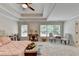 Spacious main bedroom with a trey ceiling, natural light, and stylish decor at 1868 Birch Briar Bnd, Lawrenceville, GA 30043