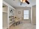 Charming office space with custom built-ins, modern desk, and lots of natural light at 1868 Birch Briar Bnd, Lawrenceville, GA 30043