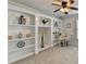 Comfortable office with built-in bookshelves, neutral walls, and a contemporary desk at 1868 Birch Briar Bnd, Lawrenceville, GA 30043