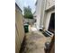 Exterior backyard view features a storage shed, concrete patio, and entrance to home at 2009 Oak Park Ln, Decatur, GA 30032