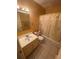 Bathroom with a shower/tub combo, a single sink vanity, and tile flooring at 2009 Oak Park Ln, Decatur, GA 30032