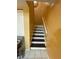 An interior shot of a carpeted stairway leading upstairs at 2009 Oak Park Ln, Decatur, GA 30032