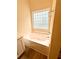 Bright bathroom features a corner soaking tub with a privacy window at 4460 Greycliff Pte, Douglasville, GA 30135