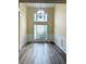 Dining room featuring a large chandelier and wainscotting at 4460 Greycliff Pte, Douglasville, GA 30135