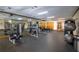 Fitness center with mirrors, weights, machines, and rubber flooring at 4460 Greycliff Pte, Douglasville, GA 30135