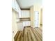 Kitchen area boasting a pantry and plenty of white cabinets at 4460 Greycliff Pte, Douglasville, GA 30135