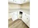 Kitchen cabinet featuring white cabinetry and a lazy susan at 4460 Greycliff Pte, Douglasville, GA 30135