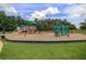 Community playground with multiple play structures and swings at 4460 Greycliff Pte, Douglasville, GA 30135