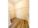 Walk-in closet features installed wire shelving with wood flooring at 4460 Greycliff Pte, Douglasville, GA 30135