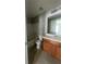 Standard bathroom with a shower-tub combo and a standard vanity at 6361 Redan Sq, Lithonia, GA 30058