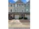 Charming townhome with a one car garage and a well maintained front yard at 6361 Redan Sq, Lithonia, GA 30058