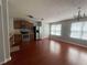 Traditional kitchen featuring stainless steel appliances, and wood laminate flooring at 6361 Redan Sq, Lithonia, GA 30058