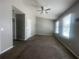 Spacious main bedroom with vaulted ceilings, a ceiling fan, and natural light at 6361 Redan Sq, Lithonia, GA 30058