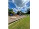 Community playground with swings, slide, and climbing structure for outdoor fun and recreation at 6361 Redan Sq, Lithonia, GA 30058