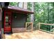 Spacious wooden back deck offers great space for outdoor enjoyment and entertaining at 1310 Larkview Sw Dr, Lilburn, GA 30047