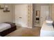 This spacious bedroom features a growth chart, closet, and view into another room via a well-placed mirror at 1310 Larkview Sw Dr, Lilburn, GA 30047