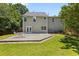 Large, level backyard with patio area, perfect for outdoor entertaining at 305 Hickory Pointe Ct, Villa Rica, GA 30180