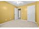Bedroom with multiple closets and access to additional rooms at 305 Hickory Pointe Ct, Villa Rica, GA 30180