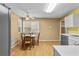 Eat-in kitchen with a table, ceiling fan, and stainless steel appliances at 305 Hickory Pointe Ct, Villa Rica, GA 30180