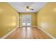 Bright living room with hardwood floors and access to the backyard at 305 Hickory Pointe Ct, Villa Rica, GA 30180