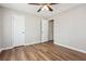 The bedroom features wood floors and ceiling fan at 5119 Ne Worsham St, Covington, GA 30014
