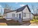 Exterior view of home with fresh paint and a front porch at 5119 Ne Worsham St, Covington, GA 30014