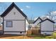 Rear exterior view with wood deck, yard and access to small building at 5119 Ne Worsham St, Covington, GA 30014
