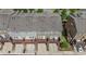 Aerial view of townhomes with garages, decks, and manicured lawns at 531 Headwind Way, Alpharetta, GA 30005
