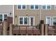 Townhome features a rear deck space, with a door to a fenced-in yard at 531 Headwind Way, Alpharetta, GA 30005
