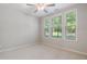 Serene bedroom with plush carpeting and abundant natural light at 531 Headwind Way, Alpharetta, GA 30005