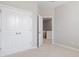 Bedroom featuring a double door closet for optimal storage at 531 Headwind Way, Alpharetta, GA 30005