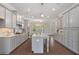 Well-appointed kitchen with large center island and stainless steel appliances at 531 Headwind Way, Alpharetta, GA 30005