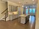Updated kitchen featuring granite countertops, a center island with a sink, and stainless steel appliances at 531 Headwind Way, Alpharetta, GA 30005