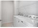 Laundry room with tile flooring and modern washing machine at 531 Headwind Way, Alpharetta, GA 30005