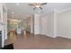 Open-concept floor plan of a living room with gray walls and wood floors at 531 Headwind Way, Alpharetta, GA 30005