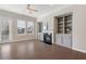 Elegant living room with a cozy fireplace and beautiful built-in shelves at 531 Headwind Way, Alpharetta, GA 30005