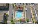 Aerial view of the clean neighborhood pool with a bathhouse and plenty of space to lounge at 531 Headwind Way, Alpharetta, GA 30005